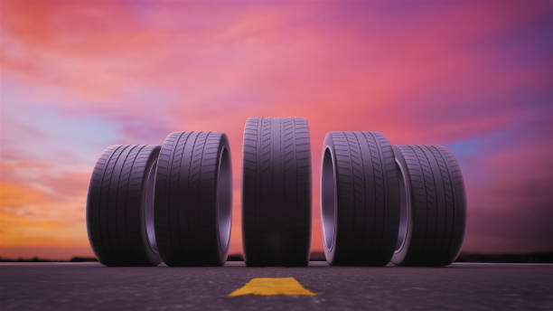 istock 3d render car tires rolling on asphalt in the sunset 1307781836