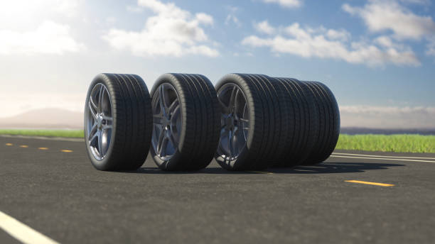 istock 3d render car tires rolling on asphalt in the summer 1307781845