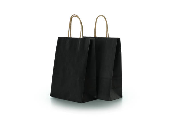 istock Black paper bags isolated on white background 1307781894