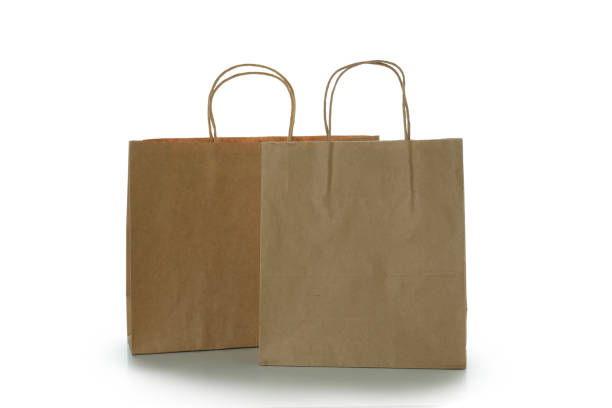 istock Blank paper bags isolated on white background 1307781981
