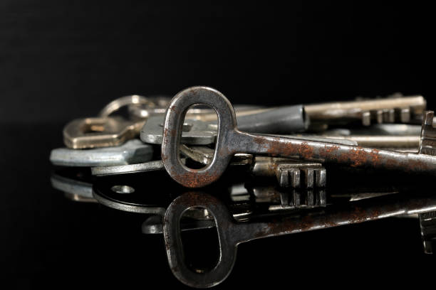 istock Group of useless old and worn door keys 1307782100