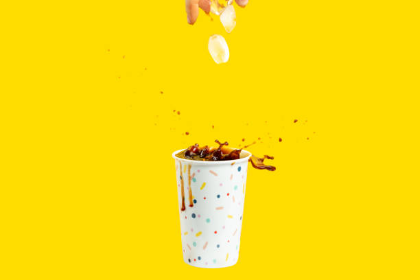 istock coffee glass with splash and ice cubes, morning coffee 1307782394