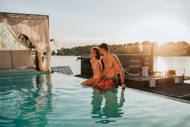 istock Perfect date is next to pool 1307782656