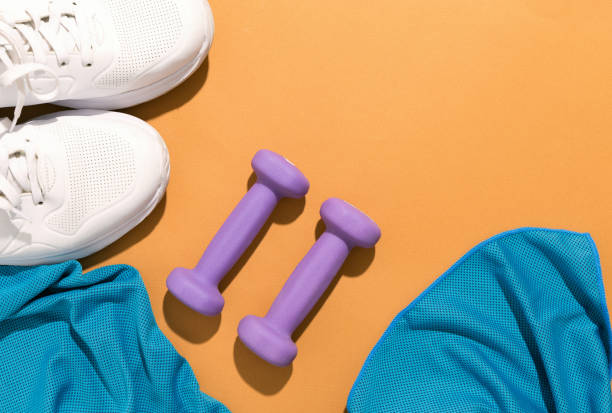 istock Sports dumbbell weights top view 1307783901