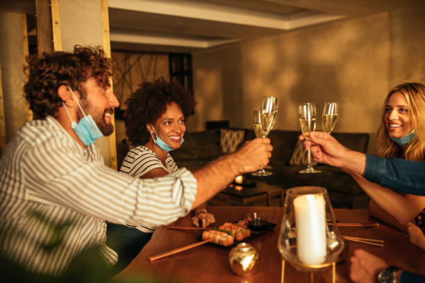 istock Friends toasting on a dinner party 1307784386
