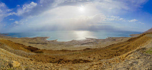 istock Panoramic view of the Dead Sea, with sun beams 1307788205