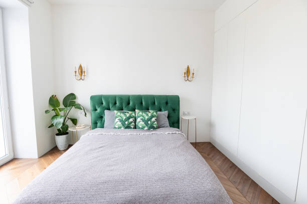 istock Generous double bedroom with large sash windows and high ceilings 1307789191