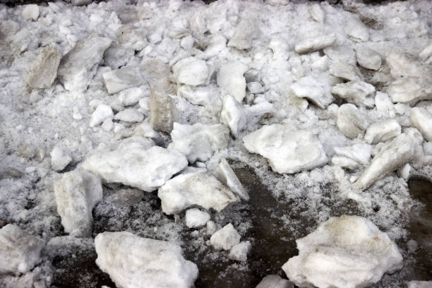 istock large chunks of snow that fell from the roof 1307791180