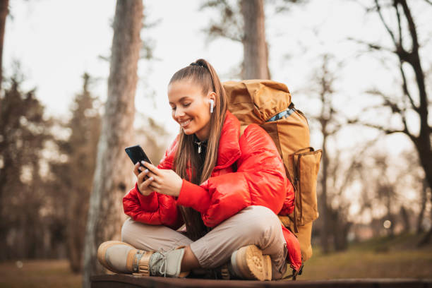 istock Happy young woman enjoying in nature 1307791191