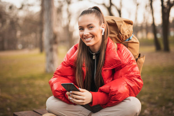 istock Happy young woman enjoying in nature 1307793206