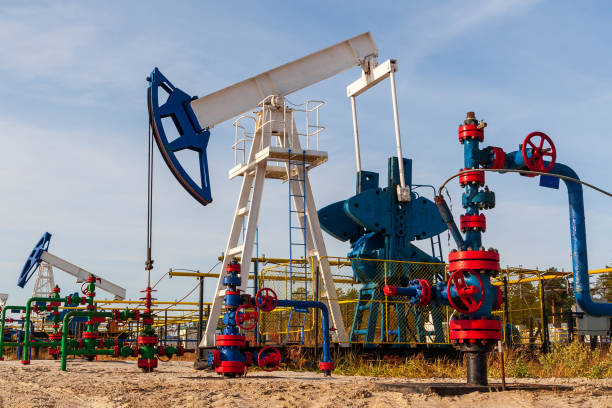 istock Oil pumps work on a sunny day. 1307793892