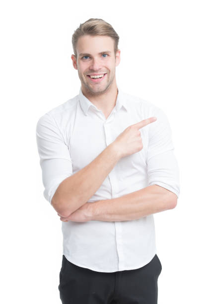 istock In that direction. Happy man pointing index finger isolated on white. Pointing for advertising. Pointing gesture and gesturing. Pointing and promoting. Shop for sale. Marketing and promotion 1307794086