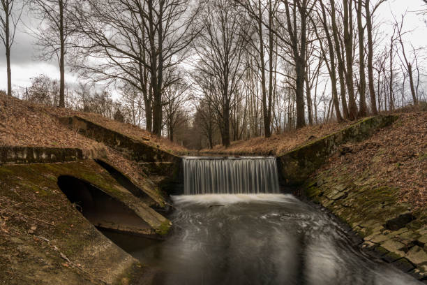 Fish ladder for salmon in the streaming water of a creek in Sweden. Long exposure photo