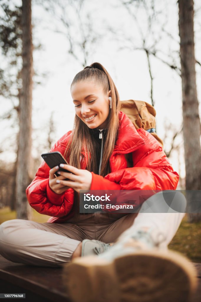 Happy young woman enjoying in nature Teenagers Only Stock Photo