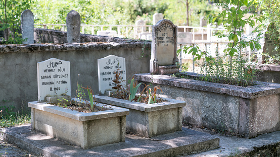 Istanbul, Turkey - October 2012: Muslim graves in a cemetery in Istanbul, Turkey