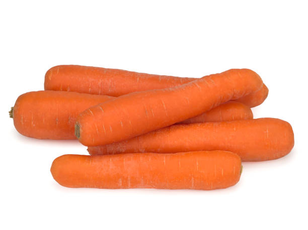 istock Washed carrots isolated on white background, close up 1307799026
