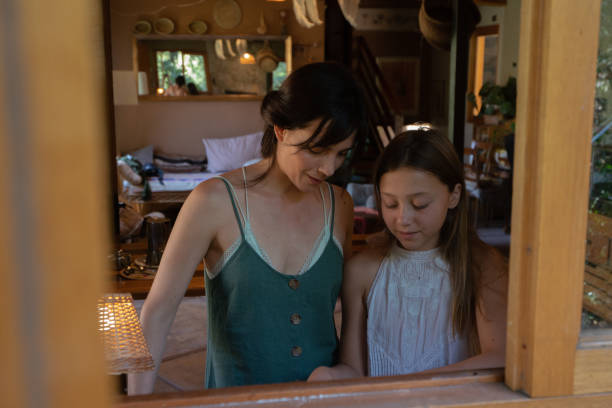 istock mother and daughter cook a casuela 1307799109