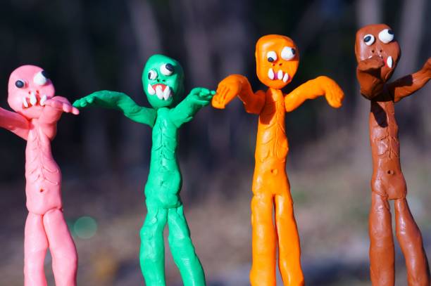 istock Funny colorful zombie figures in the forest. 1307800146