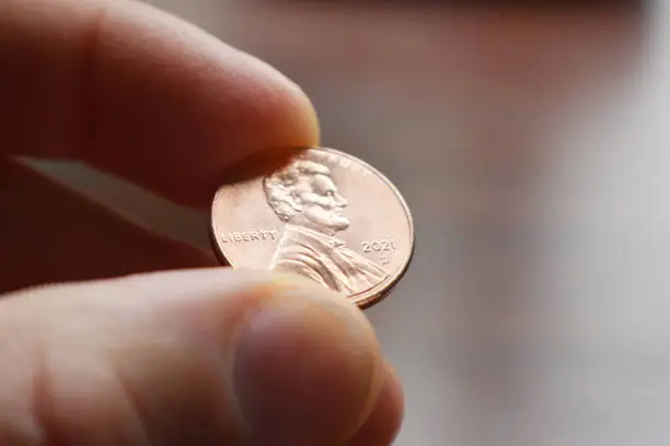 Photo of 2021 Penny In Fingers Close Up High Quality