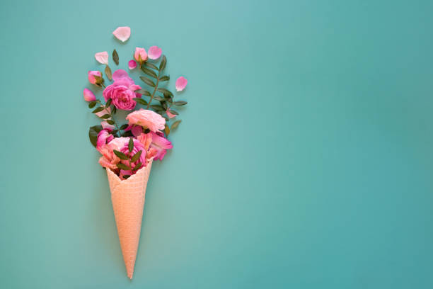 istock Waffle cone with composition of flowers 1307804627