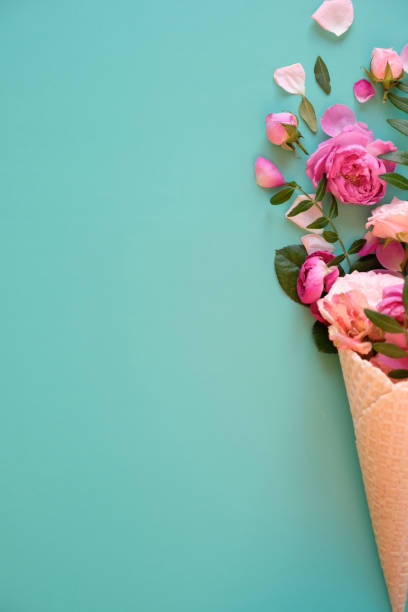 istock Waffle cone with composition of flowers 1307804634