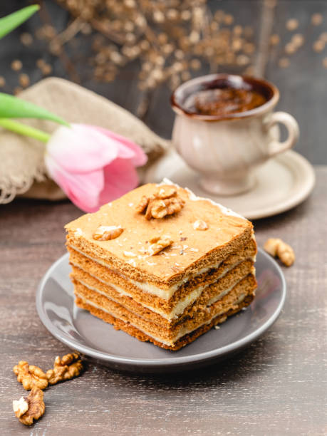 istock Slice of layered honey cake selective focus 1307807772
