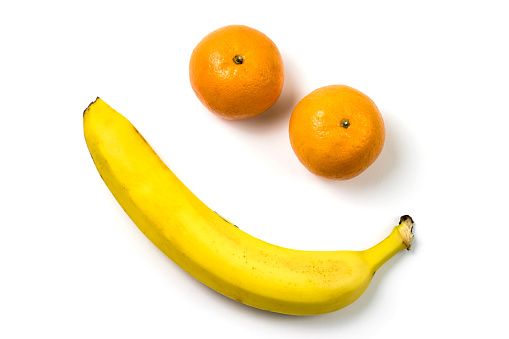 Variation of fruits, banana, strawberry, kiwi, peach, lemon, orange, pineapple
