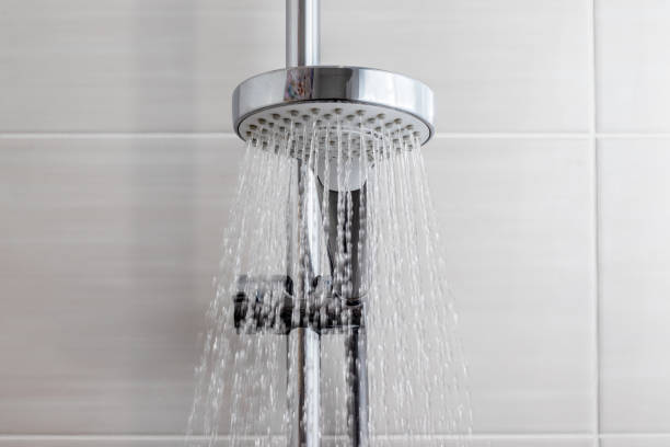 istock Water flows from the shower head in the bathroom 1307809043