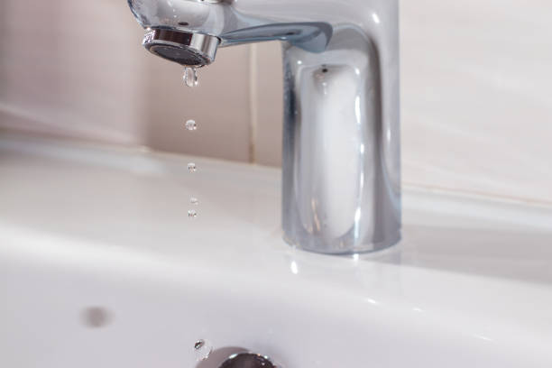 istock Water leakage from the faucet 1307809169