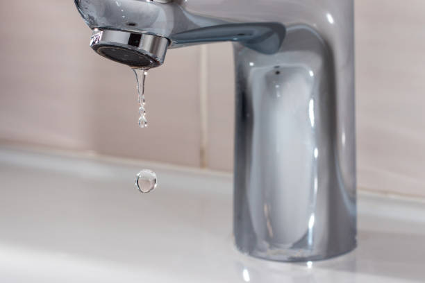 istock Water leakage from the faucet 1307809178