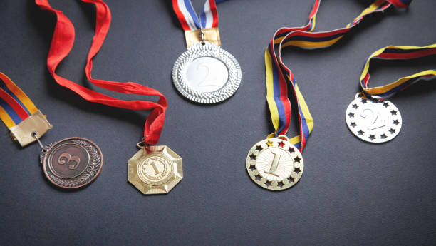 istock Medal awards for winner on black background. 1307811986