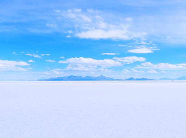 istock White salt flat desert plain Salar de Uyuni in Bolivian Andes. Endless Extremely Dry Territory. 1307815072