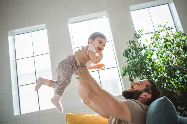 istock Father and daughter bonding at home 1307819624