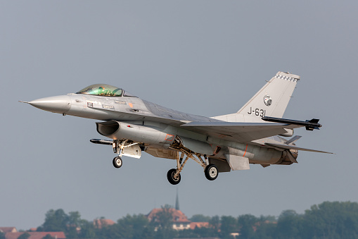 Payerne, Switzerland - September 5, 2014: Royal Netherlands Air Force General Dynamics F-16AM Fighting Falcon military jet aircraft on approach to land at Payerne Airport