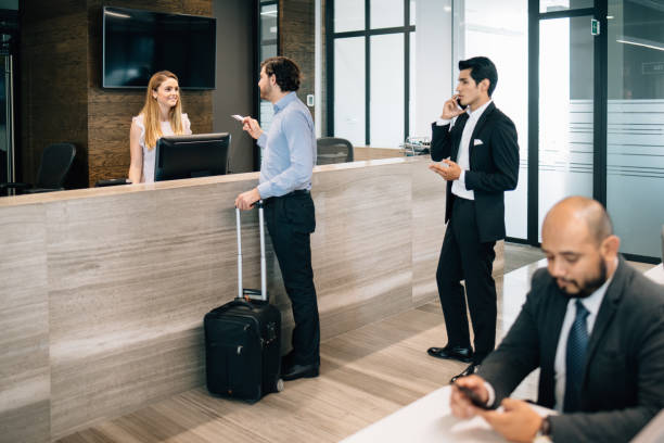 istock Business people checking in 1307825910
