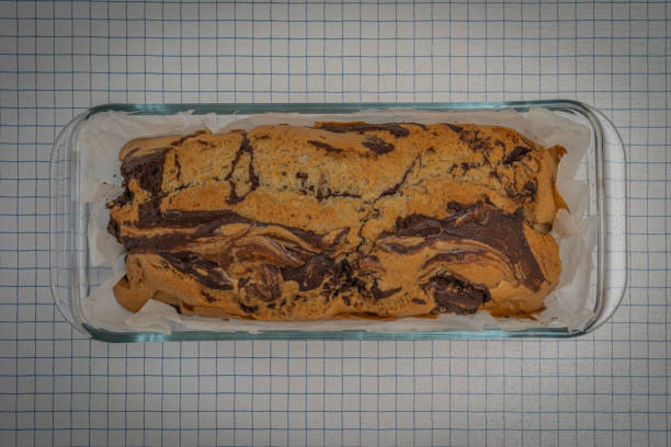 istock Paris, France: Preparation of a marble chocolate cake 1307825935