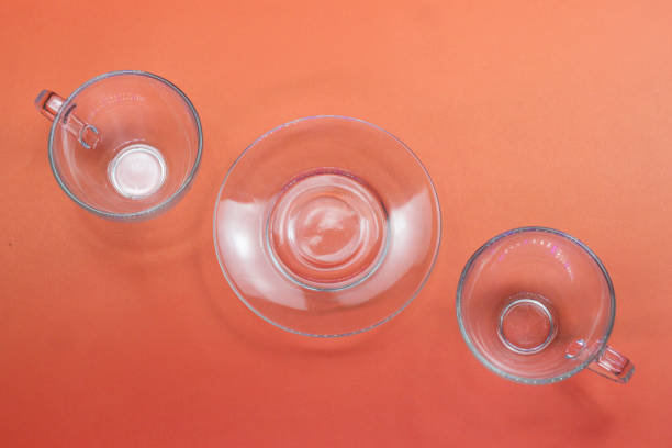 istock clear glass plates and clear glass cups 1307829127