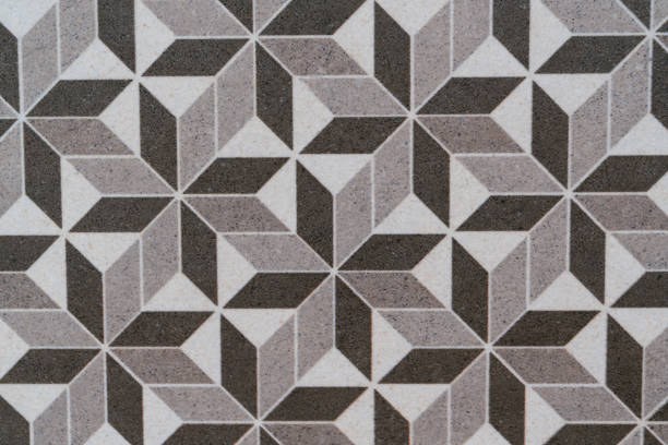 istock Illustration of brown and black rhombus-shaped forms on a white background 1307829361