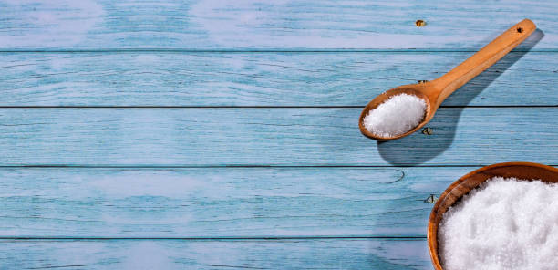 istock Magnesium chloride in wooden spoon - Mineral compound 1307835867