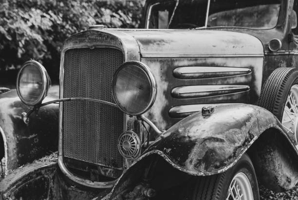 istock Black & white close up of a rusty old truck 1307837142