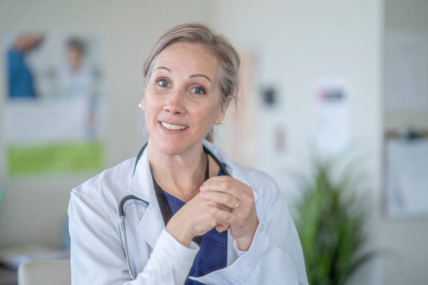 istock Female Caucasian Doctor Wearing a Lab Coat 1307838656
