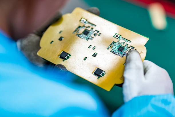 istock The worker is working on the assembly line 1307839834