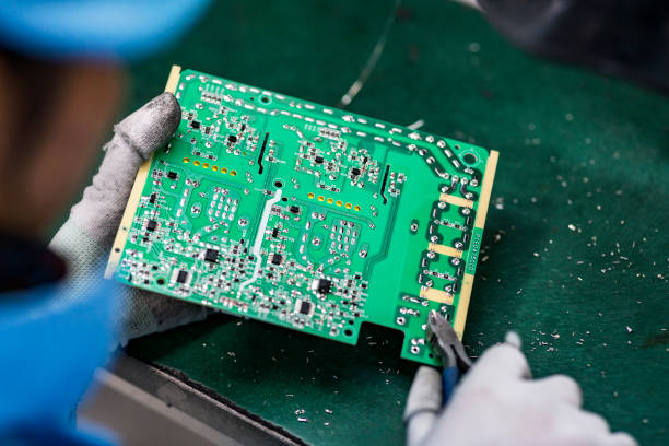 istock The worker is working on the assembly line 1307839838