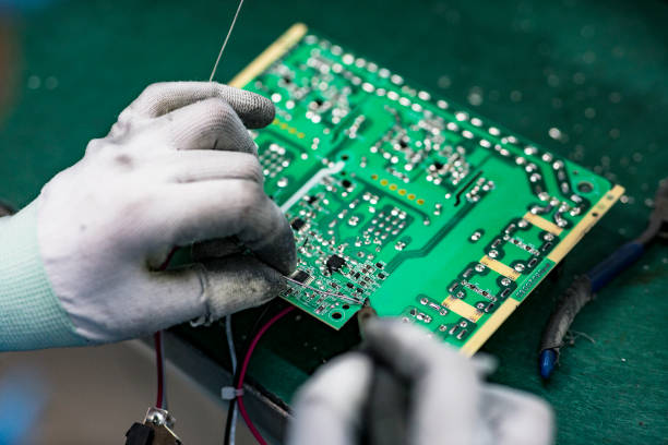 istock The worker is working on the assembly line 1307840408