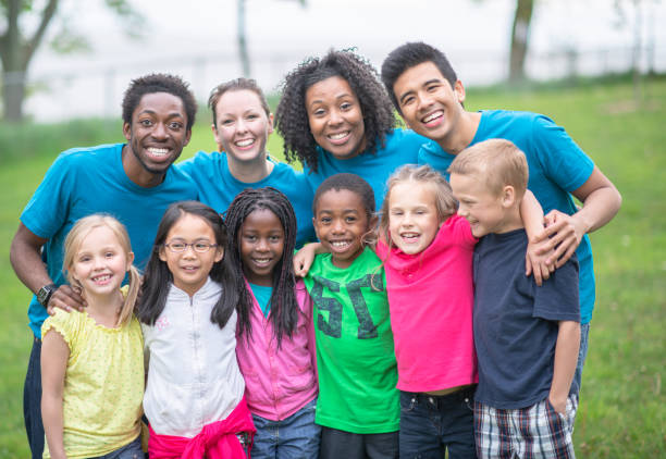 istock Camp Counselors and Children at Summer Camp 1307843000