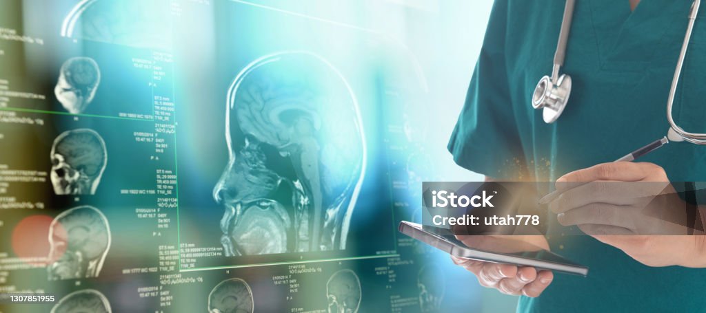 medical technology medical technology and medicine science innovation concept. doctor check up brain of patient from smartphone. Health Technology Stock Photo
