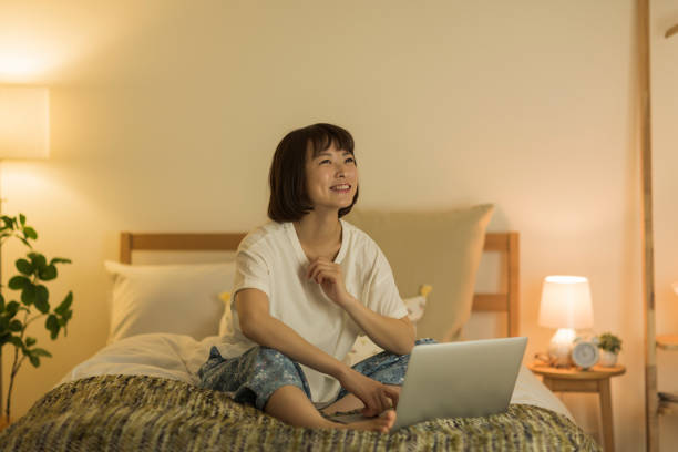 istock Young woman spending time at home 1307852836