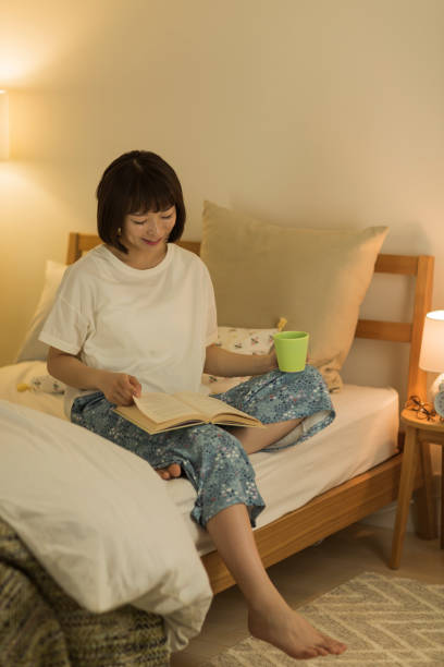 istock Young woman spending time at home 1307852839