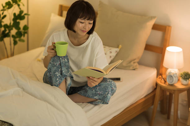 istock Young woman spending time at home 1307852840