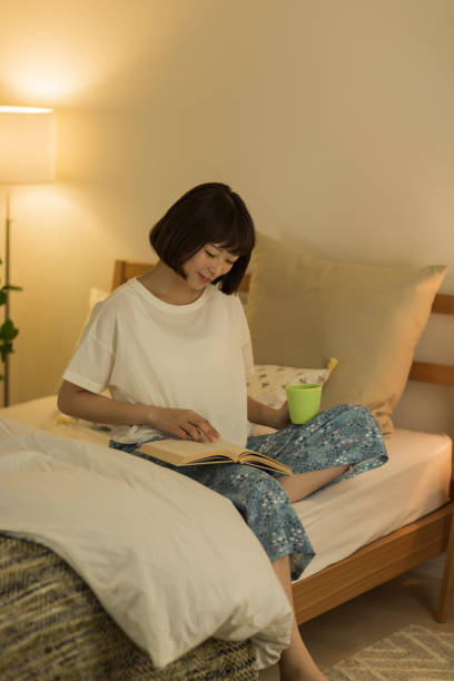 istock Young woman spending time at home 1307852847